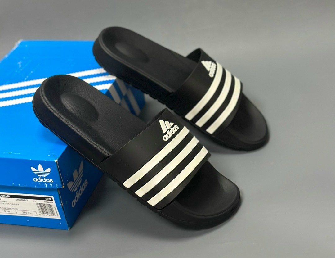 шлепанцы adidas,adidas adilette comfort slides,adidas шлепки 2026,adidas slides,adidas adilette comfort
