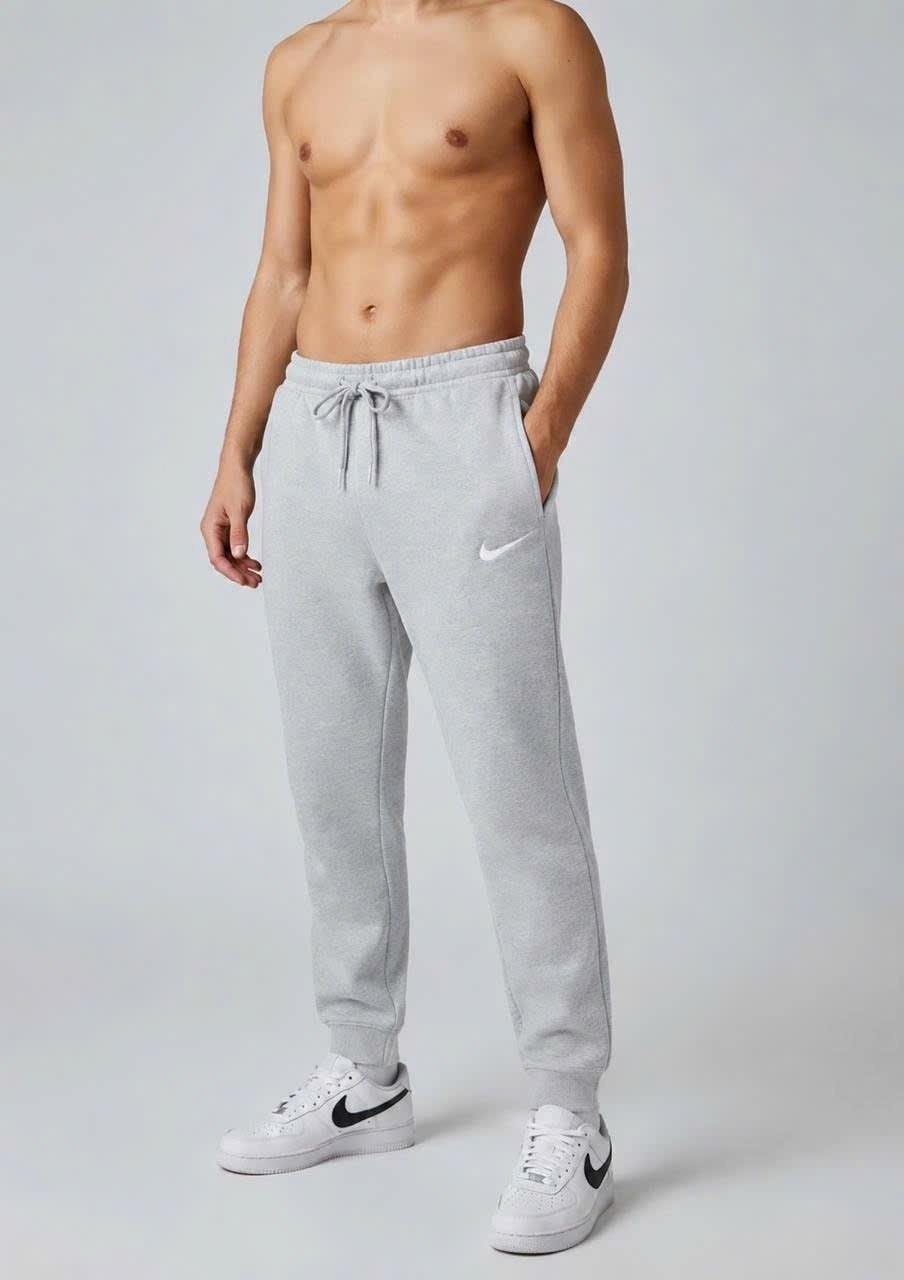 брюки мужские nike sportswear club серые,серые спортивки найк мужские,серые спортивные штаны,брюки спортивные nike,брюки спортивные мужские