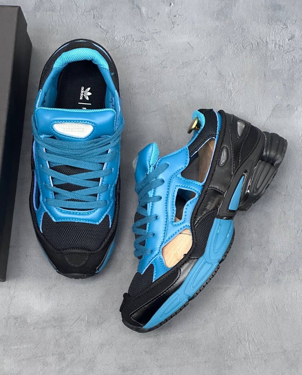 raf simons x adidas replicant ozweego,adidas raf simons x replicant ozweego black colonial blue,adidas raf simons ozweego replicant,adidas x raf simons rs replicant ozweego limited edition teal black,