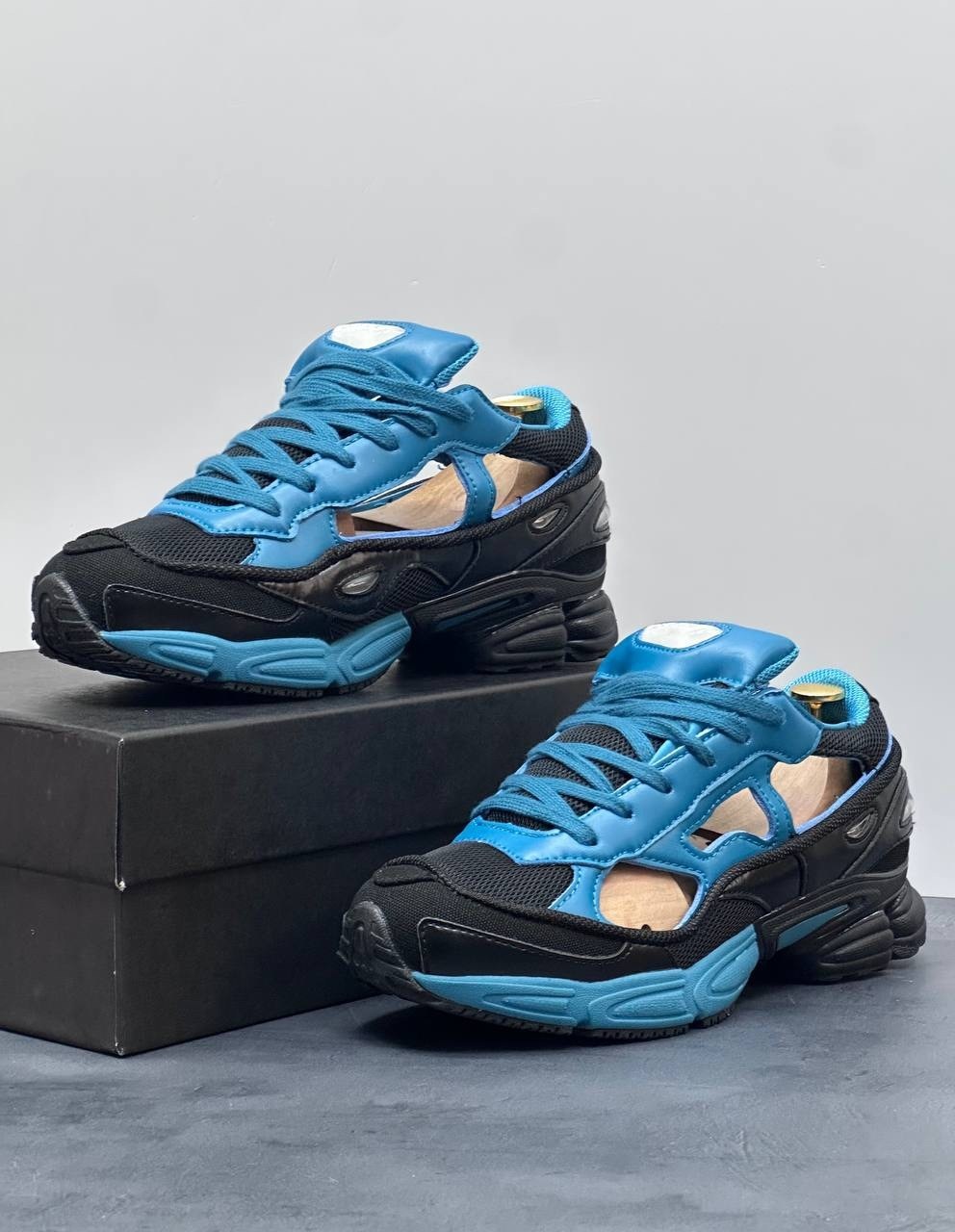 raf simons x adidas replicant ozweego,adidas raf simons x replicant ozweego black colonial blue,adidas raf simons ozweego replicant,adidas x raf simons rs replicant ozweego limited edition teal black,