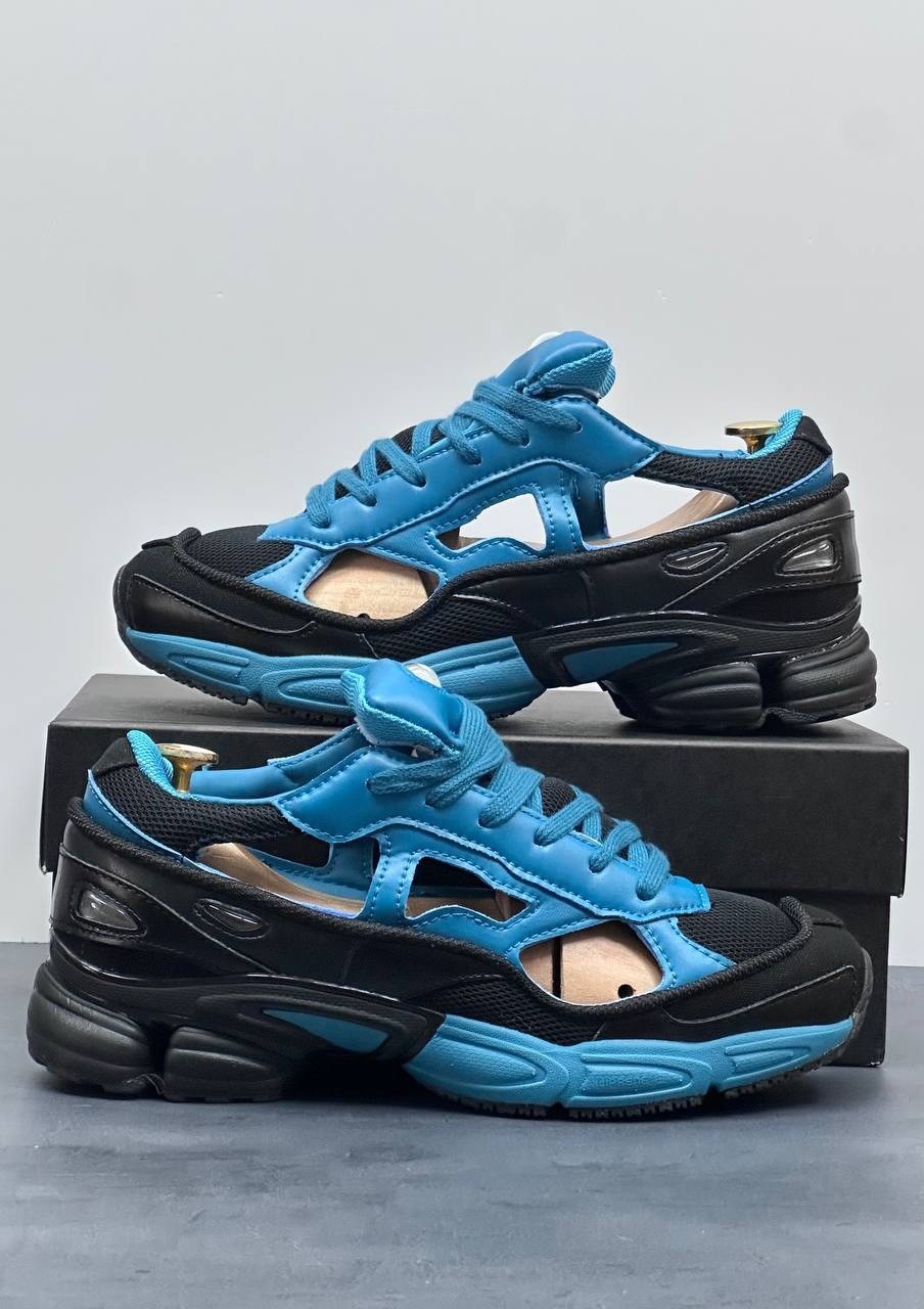 raf simons x adidas replicant ozweego,adidas raf simons x replicant ozweego black colonial blue,adidas raf simons ozweego replicant,adidas x raf simons rs replicant ozweego limited edition teal black,