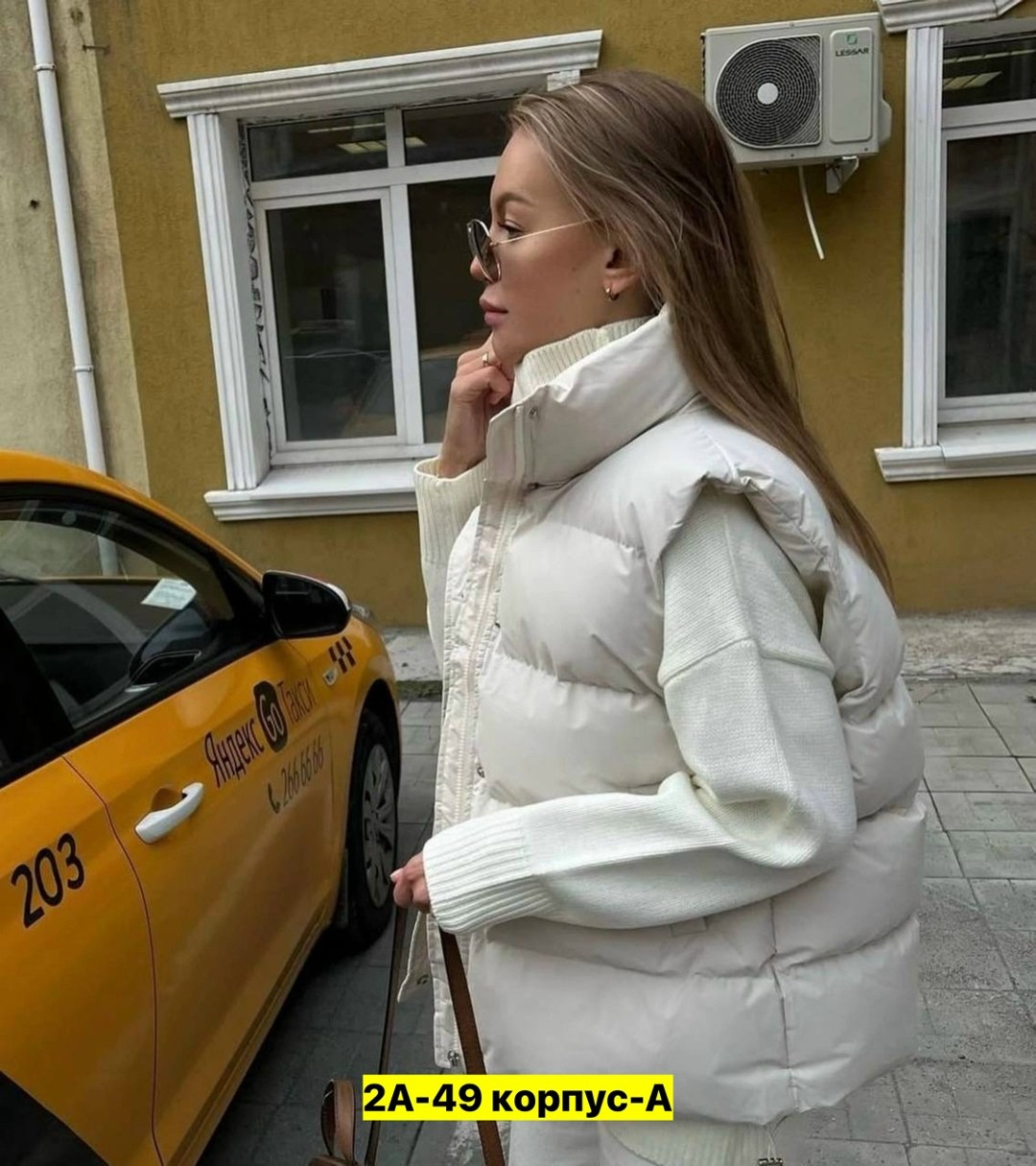 пуховой жилет,жилеты женские,женская жилетка,жилет теплый,жилеты