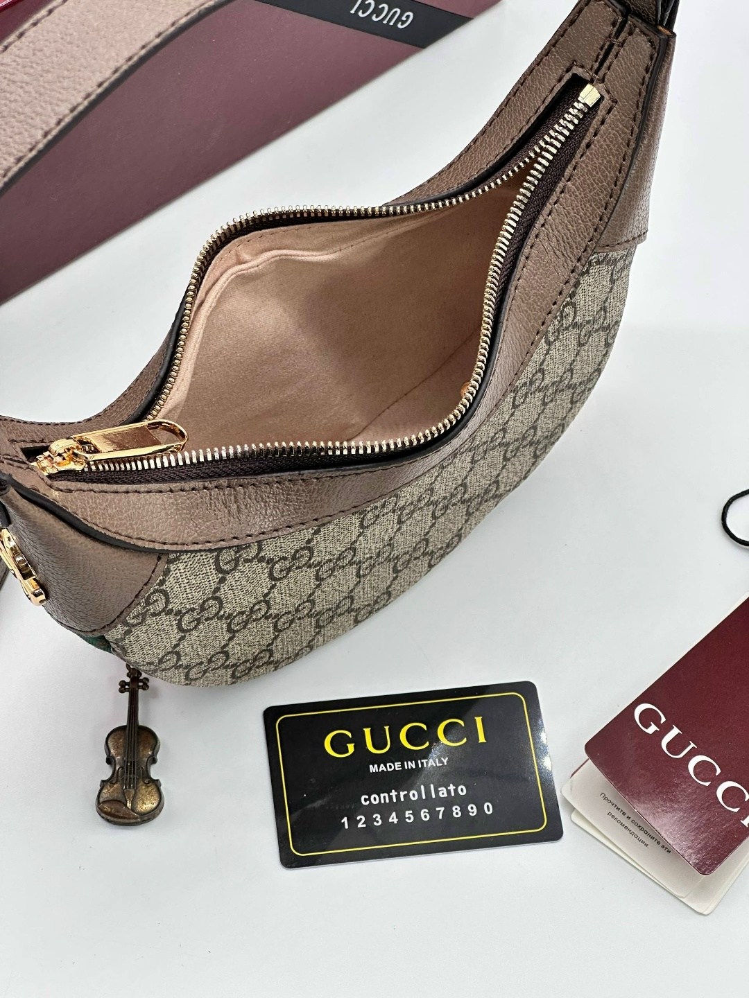 gucci сумка,женская сумка gucci,gucci сумка на плечо полумесяц,гуччи сумка женская,сумка гуччи