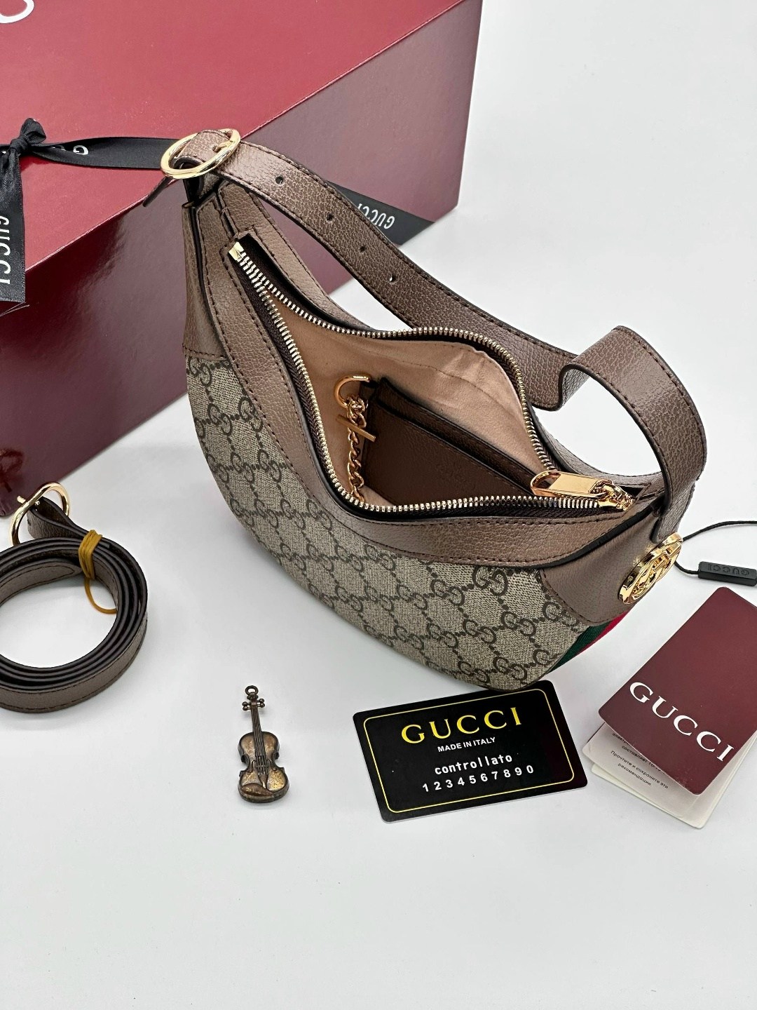 gucci сумка,женская сумка gucci,gucci сумка на плечо полумесяц,гуччи сумка женская,сумка гуччи