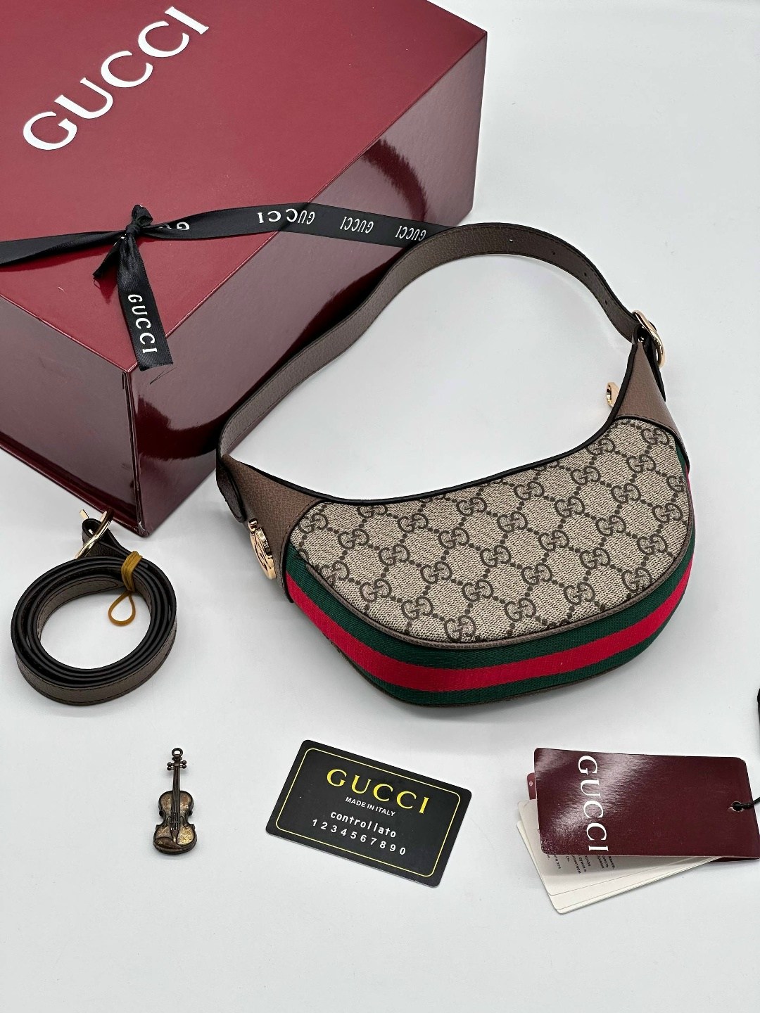 gucci сумка,женская сумка gucci,gucci сумка на плечо полумесяц,гуччи сумка женская,сумка гуччи