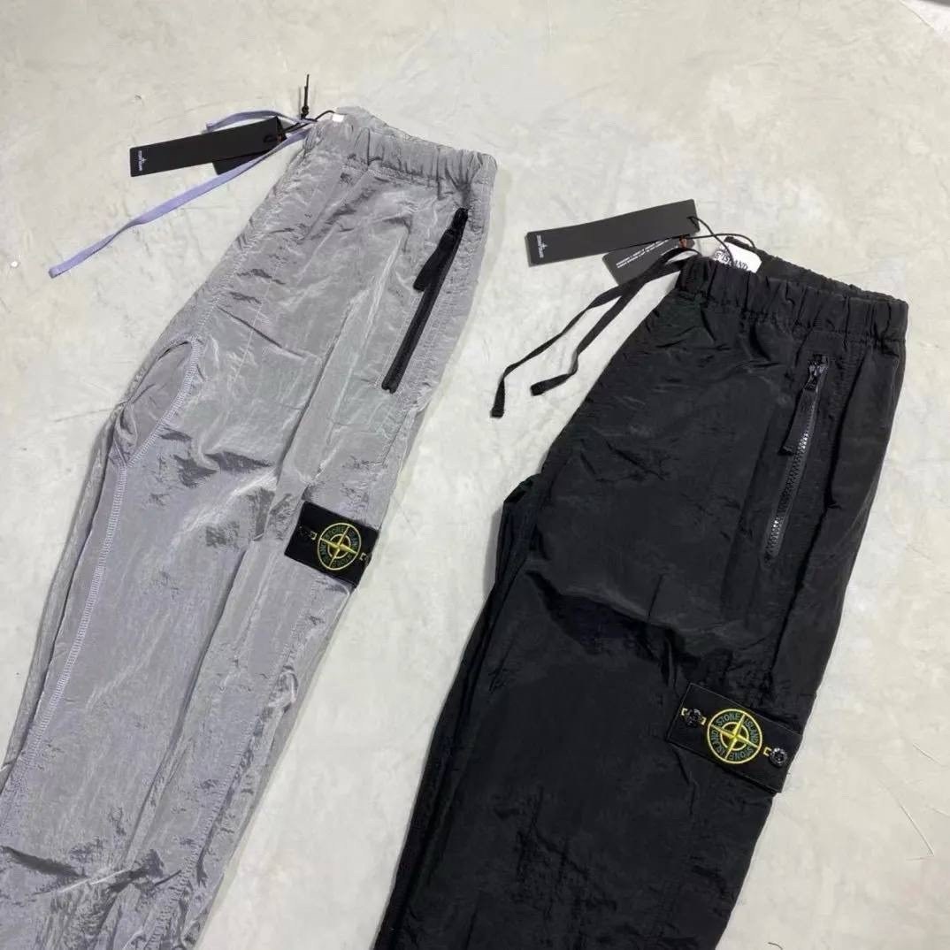 спортивные штаны stone island,штаны stone island,штаны стон айленд,stone island штаны нейлон,штаны легкие stone island nylon metal серебро
