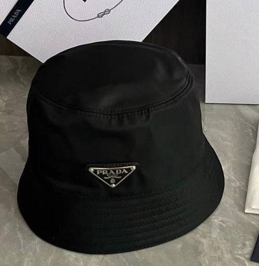 шляпа prada re-nylon bucket hat черный,prada панама,prada nylon bucket hat in black,черная панама prada,панама prada nylon