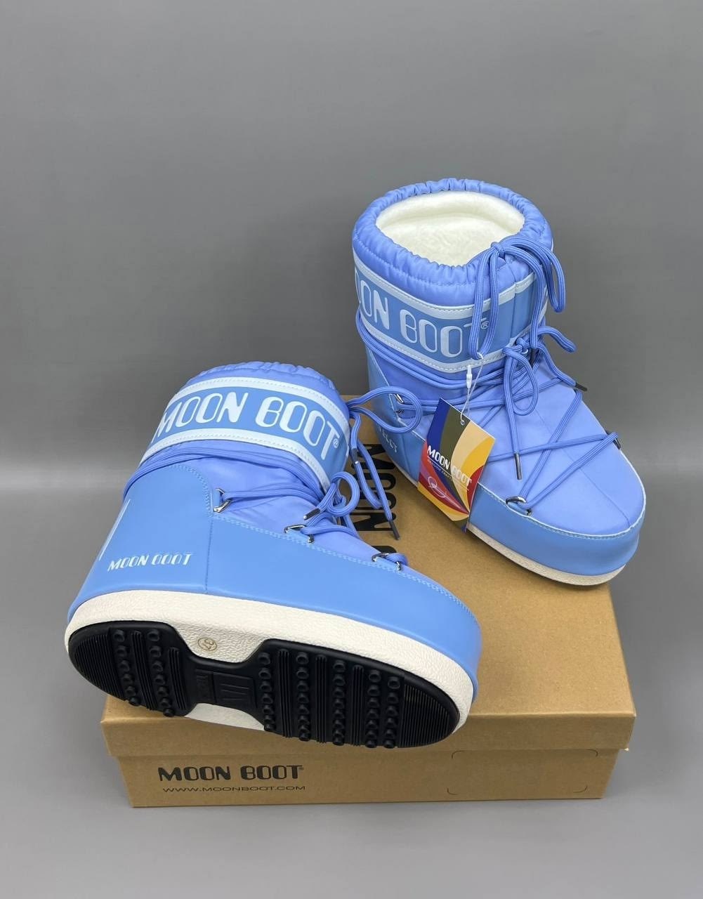 moon boot kids дутые сапоги с логотипом синий,moon boot kids двухцветные ботинки icon синий,ботинки moon boot kids icon low синий,moon boot ботинки icon low синий,зимние ботинки moon boot