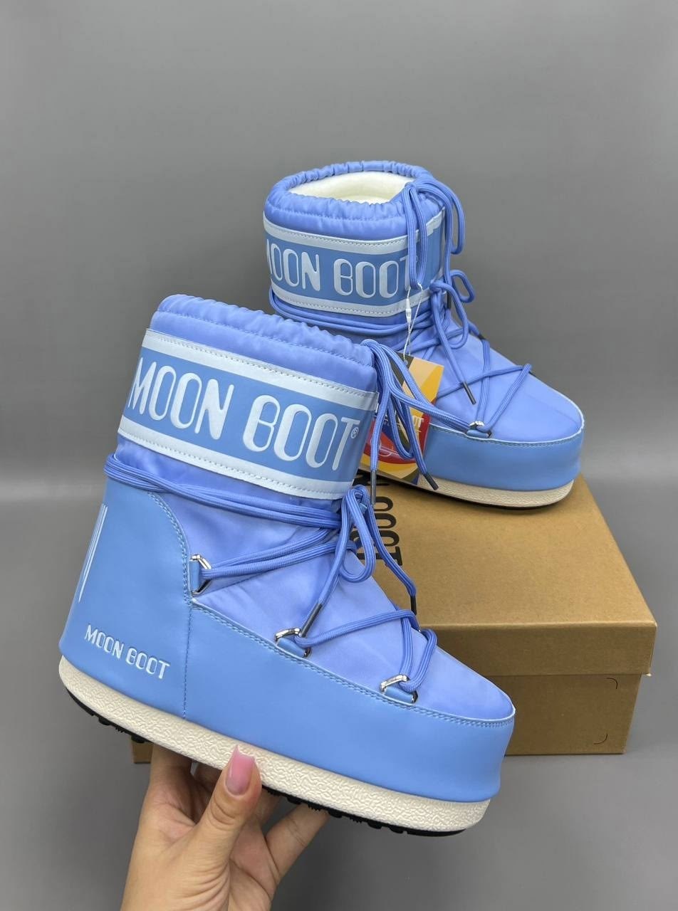 moon boot kids дутые сапоги с логотипом синий,moon boot kids двухцветные ботинки icon синий,ботинки moon boot kids icon low синий,moon boot ботинки icon low синий,зимние ботинки moon boot