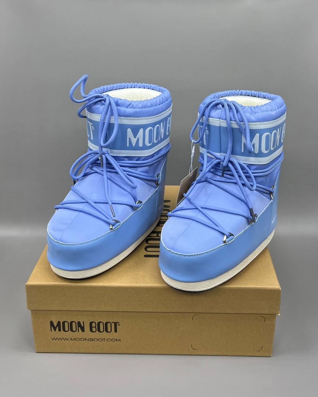 moon boot kids дутые сапоги с логотипом синий,moon boot kids двухцветные ботинки icon синий,ботинки moon boot kids icon low синий,moon boot ботинки icon low синий,зимние ботинки moon boot