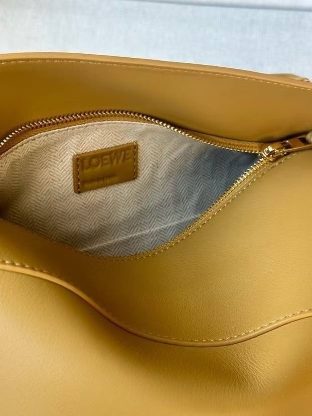 сумка loewe puzzle,кожаная сумка через плечо puzzle loewe,loewe сумка,loewe puzzle bag,маленькая кожаная сумка через плечо puzzle loewe