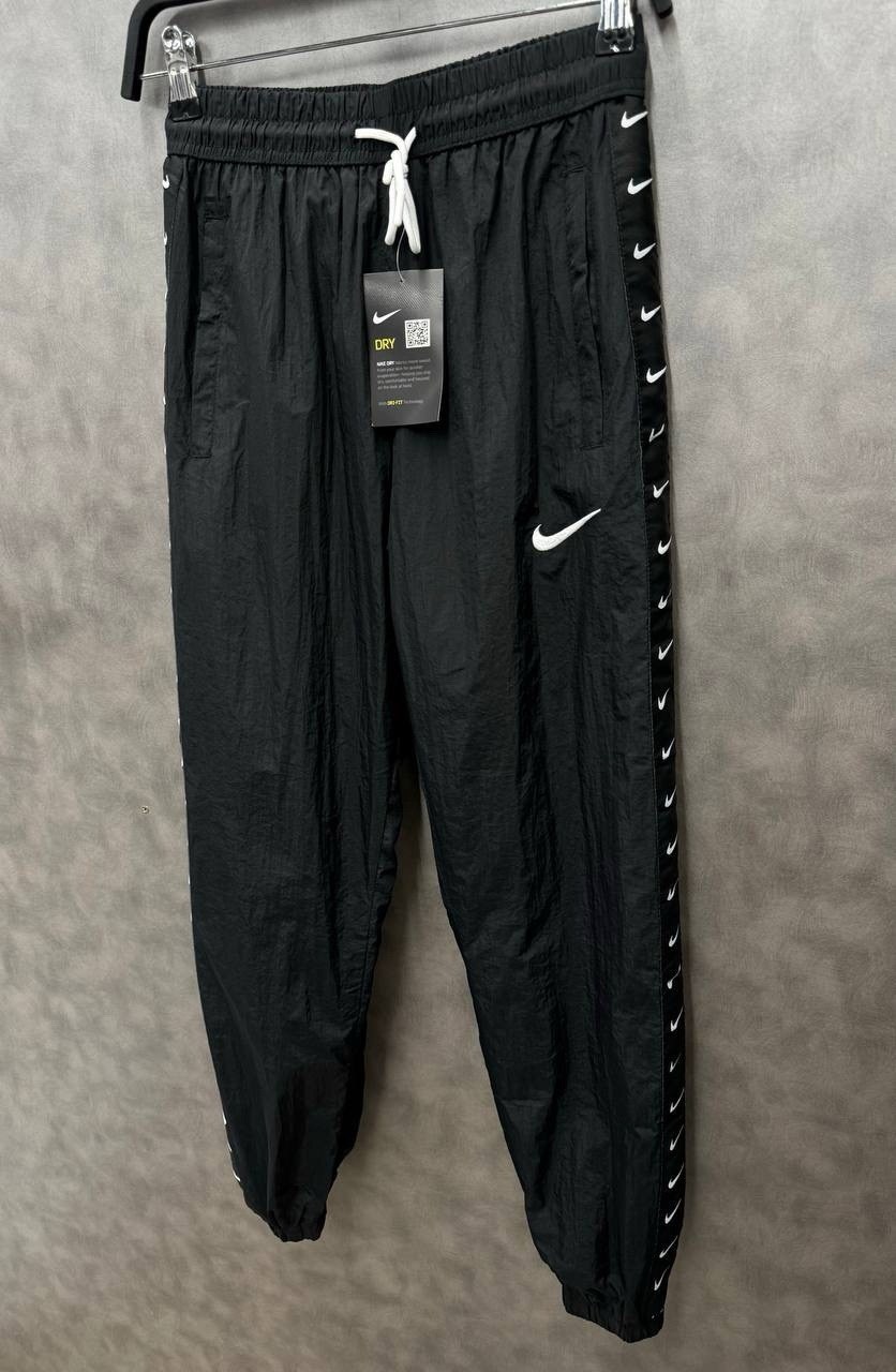 nike sportswear swoosh штаны,брюки спортивные nike,брюки спортивные nike cd0421-010,спортивные штаны,мужской спортивный брюки люкс