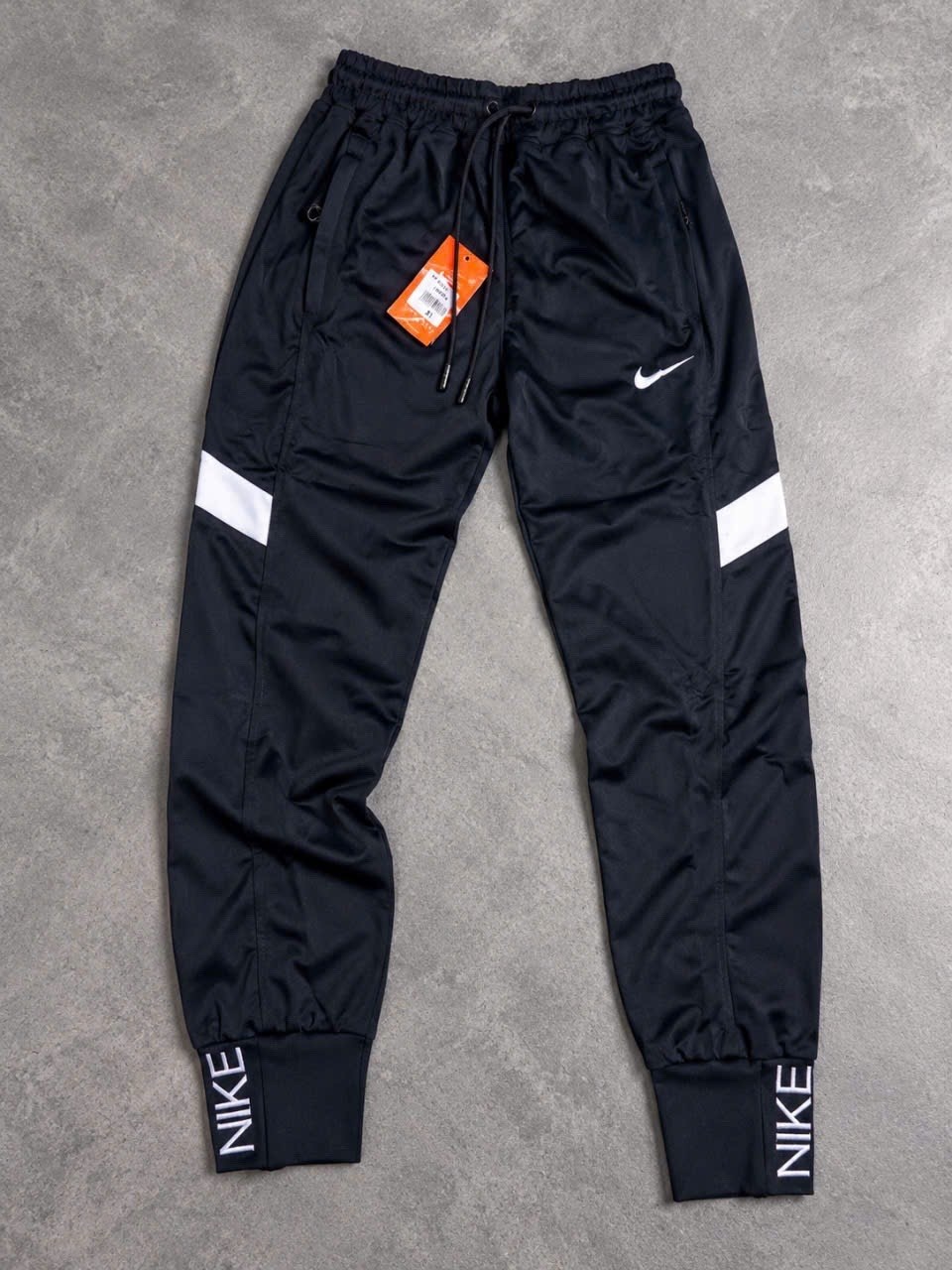 спортивные штаны nike,штаны спортивные мужские nike,штаны nike,спортивные брюки nike,плащевые штаны big swoosh летние найк джоггеры nike