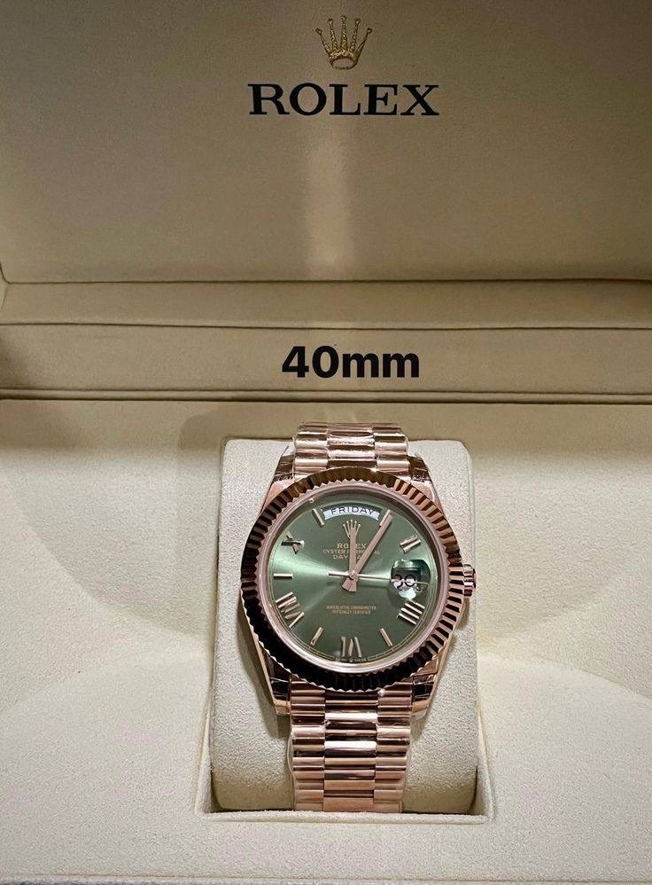 часы rolex oyster,rolex oyster,часы rolex day-date 40mm 228235,наручные часы rolex,rolex day date green gold