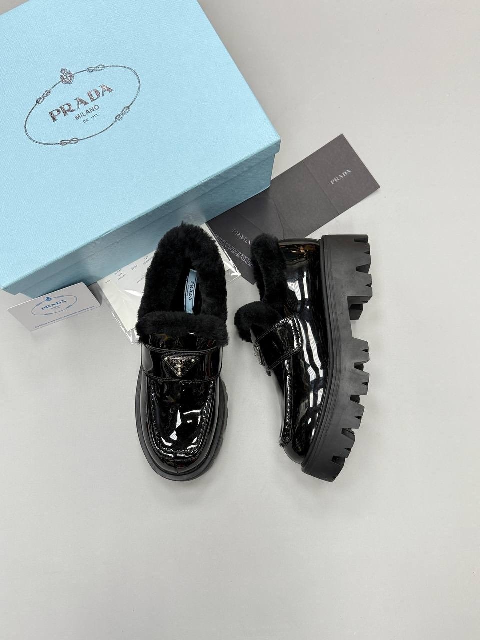 ,prada лоферы,прада лоферы,зимние кожаные черные лоферы prada brushed с мехом,женская