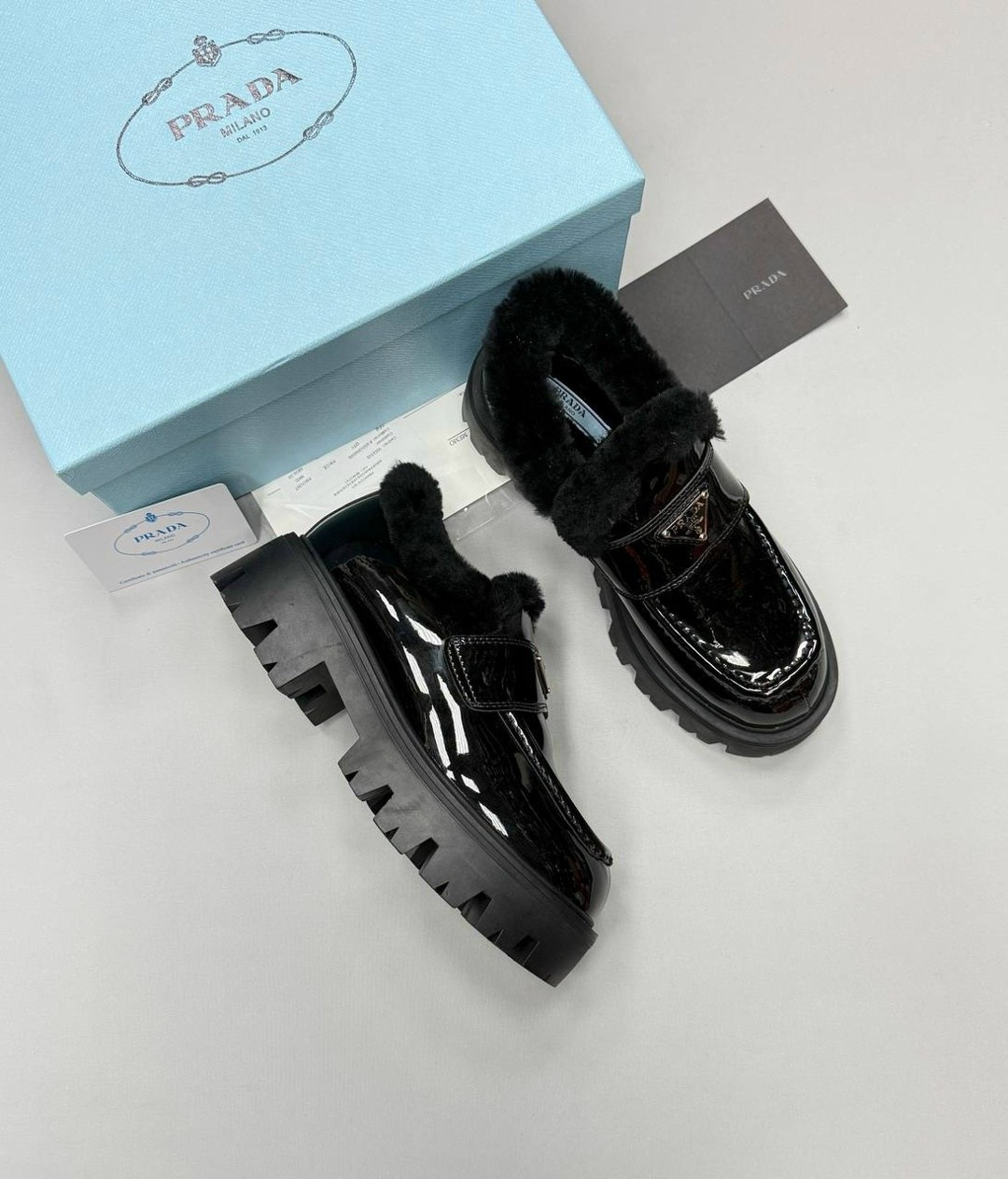 ,prada лоферы,прада лоферы,зимние кожаные черные лоферы prada brushed с мехом,женская